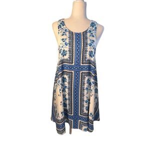 c+j Collection blue and white floral sleeveless swing dress with cross front gra